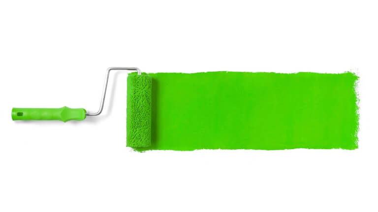 Paint roller applying paint