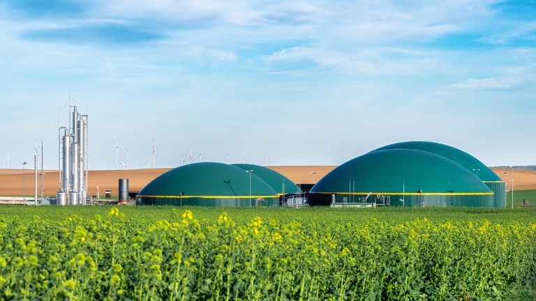 Industrial anaerobic digestion facility producing biogas from organic materials