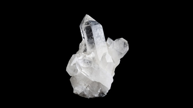 Close-up of a natural crystal with well-defined facets