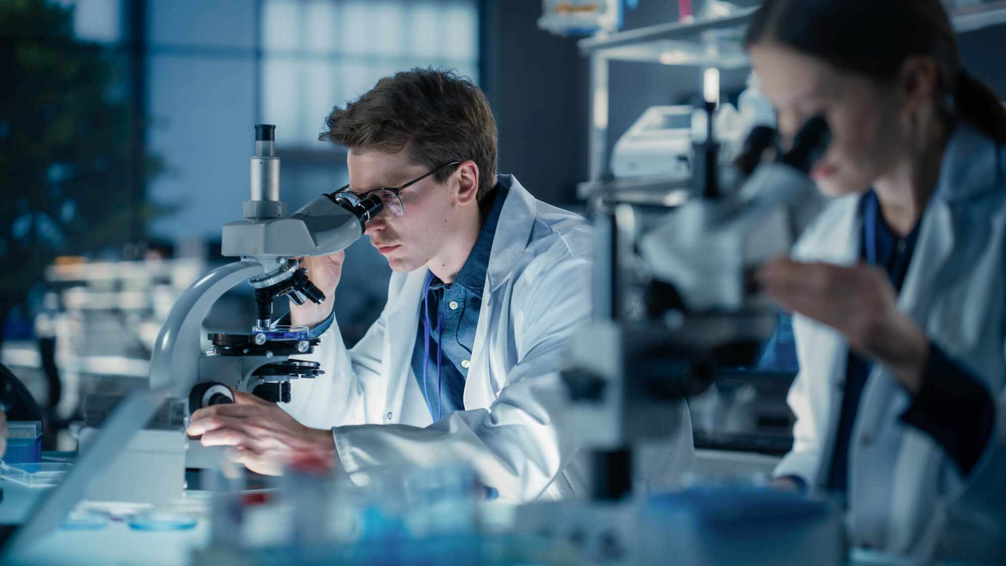 Laboratory scientist performing sample examination for radiocarbon studies