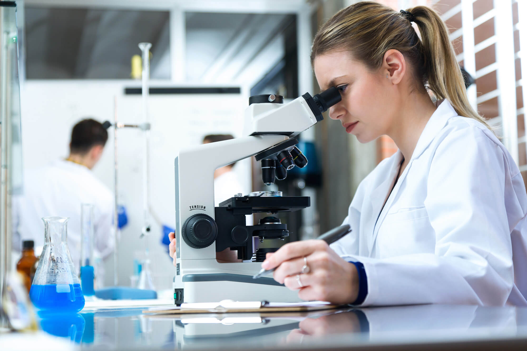 Laboratory researcher examining samples for radiocarbon analysis