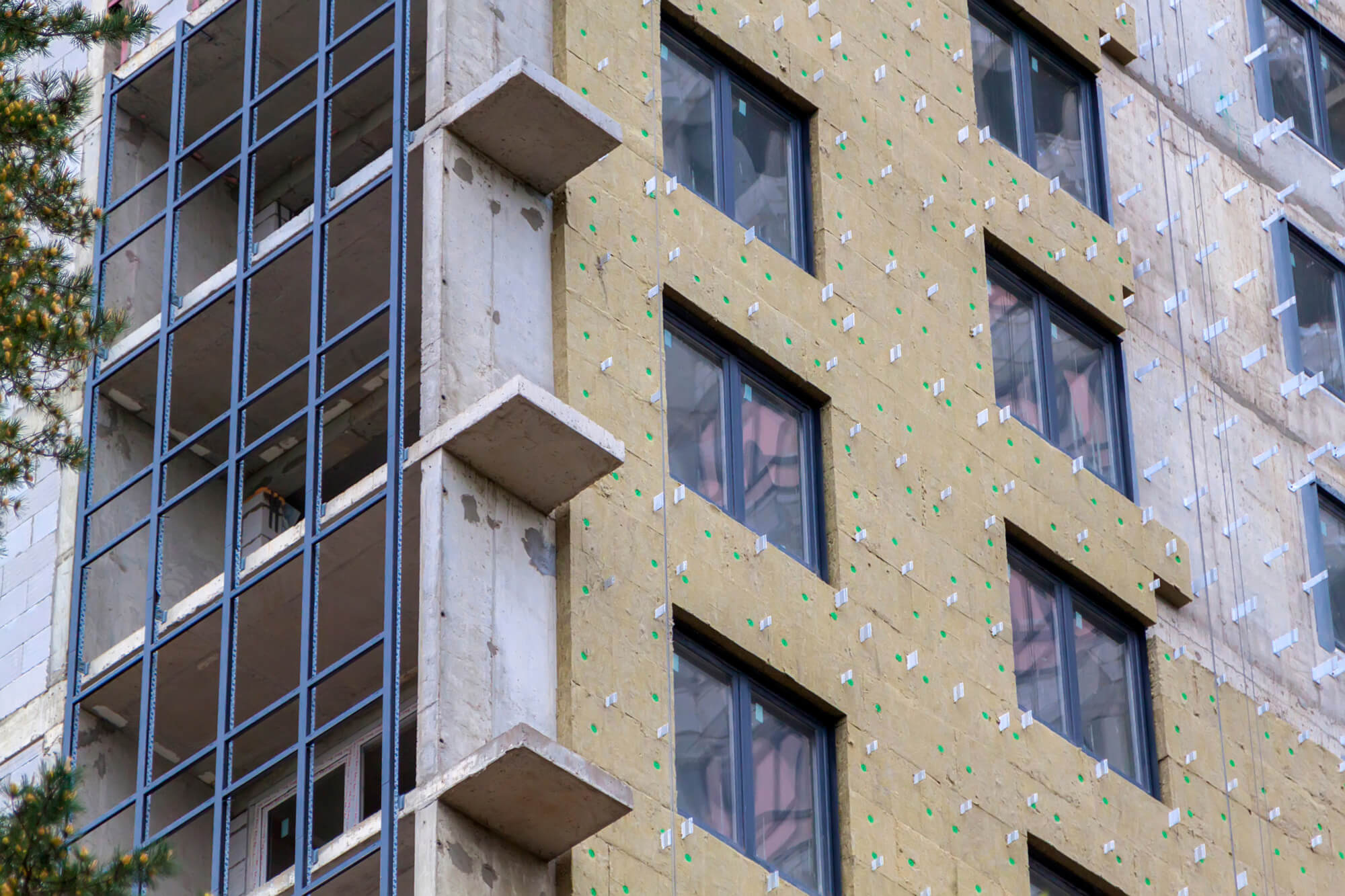 Building under construction demonstrating compliance with material requirements for RE2020 environmental certification