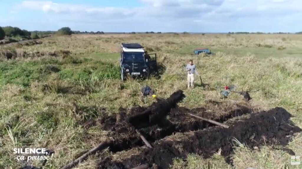 Video screenshot showing the extraction of "morta" wood by JHP Workshops